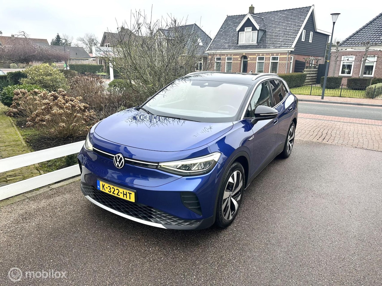 Volkswagen ID.4 - First 77 kWh ACHTERUITRIJ CAMERA CARPLAY TREKHAAK SFEERVERLICHTING ACCU GARANTIE SOH 90%!! - AutoWereld.nl