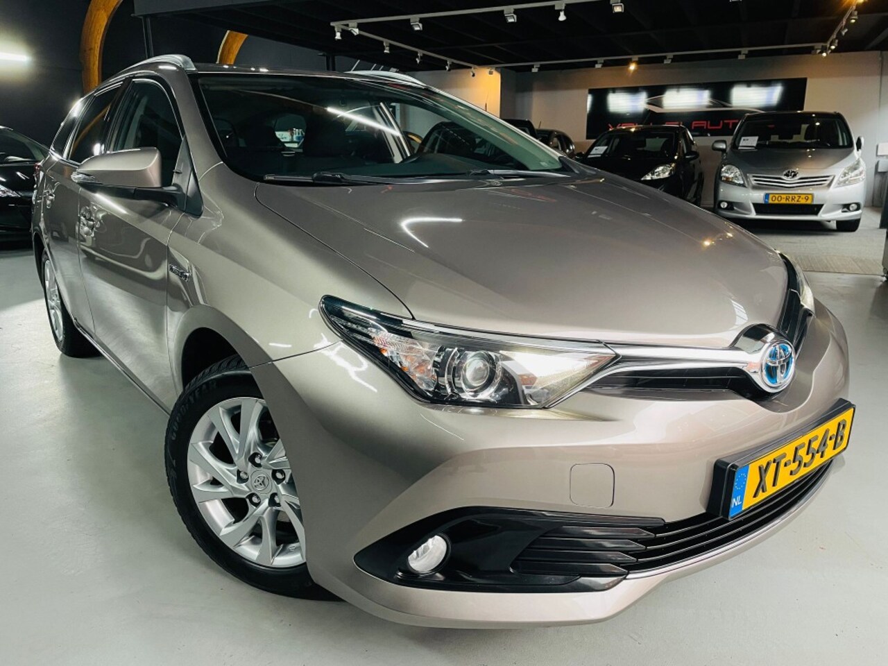 Toyota Auris Touring Sports - 1.8 Hybrid Aspiration KLIMA NAVI - AutoWereld.nl