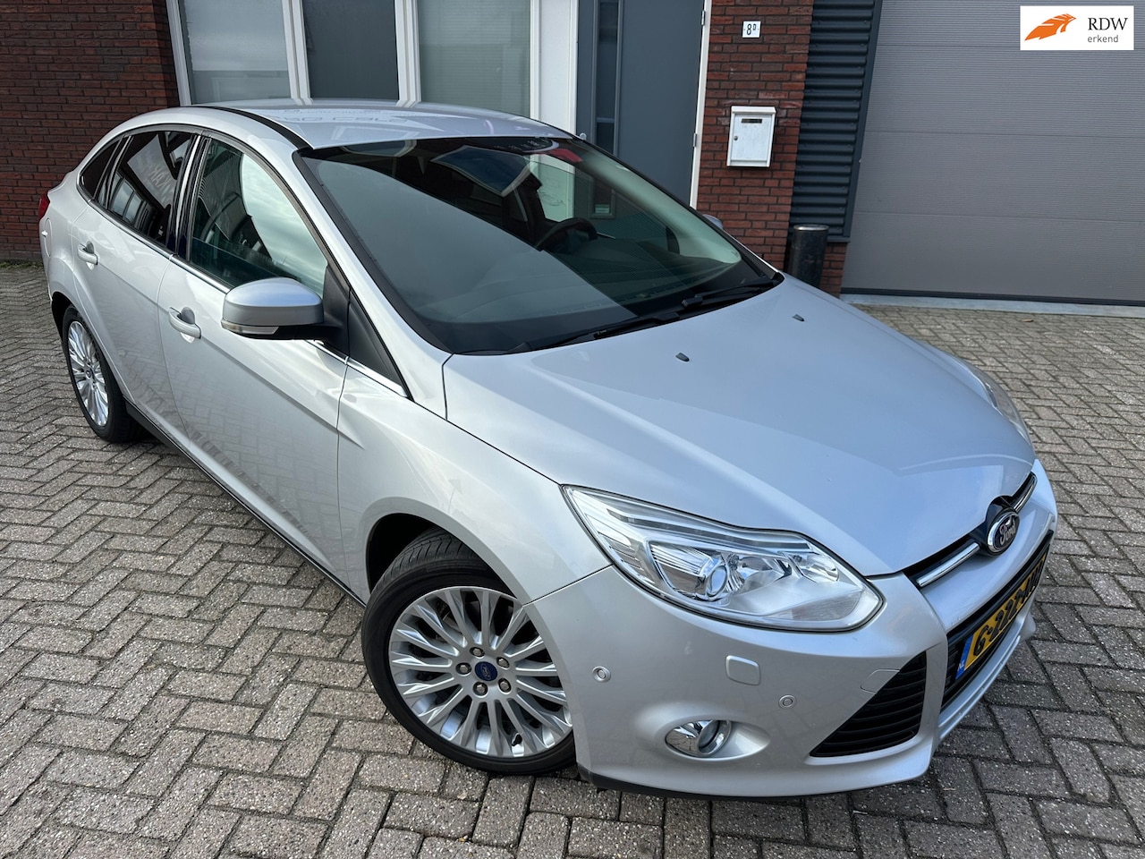 Ford Focus - 1.6 EcoBoost Titanium / Navi / PDC / Park Assist / Stoelverwarming - AutoWereld.nl