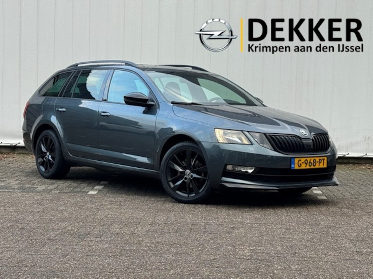 Skoda Octavia Combi - 1.0 TSI Greentech Sport Business met Navigatie, Trekhaak, Zwarte hemel, Zwarte Accenten! - AutoWereld.nl