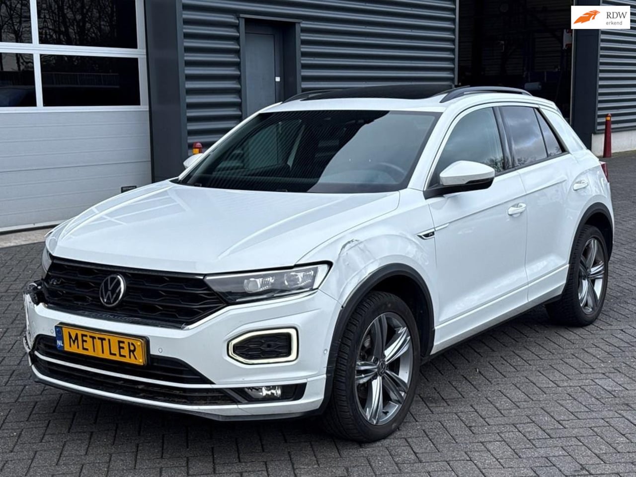 Volkswagen T-Roc - 1.5 TSI Sport Business R-Line, navigatie, camera - AutoWereld.nl