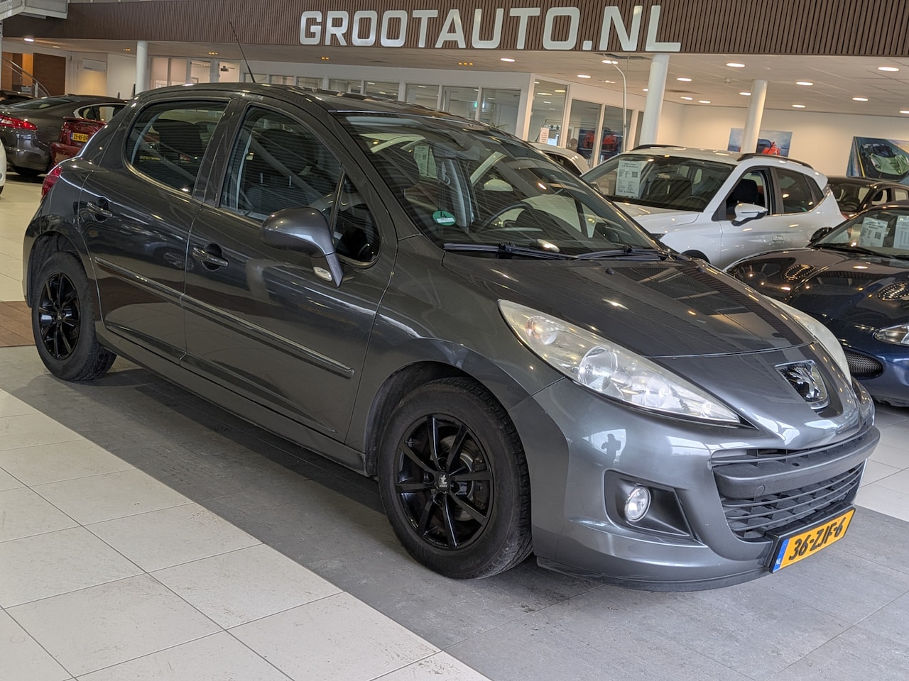 Peugeot 207 - 1.4 Acces Lite Airco, Stuurbekrachtiging - AutoWereld.nl