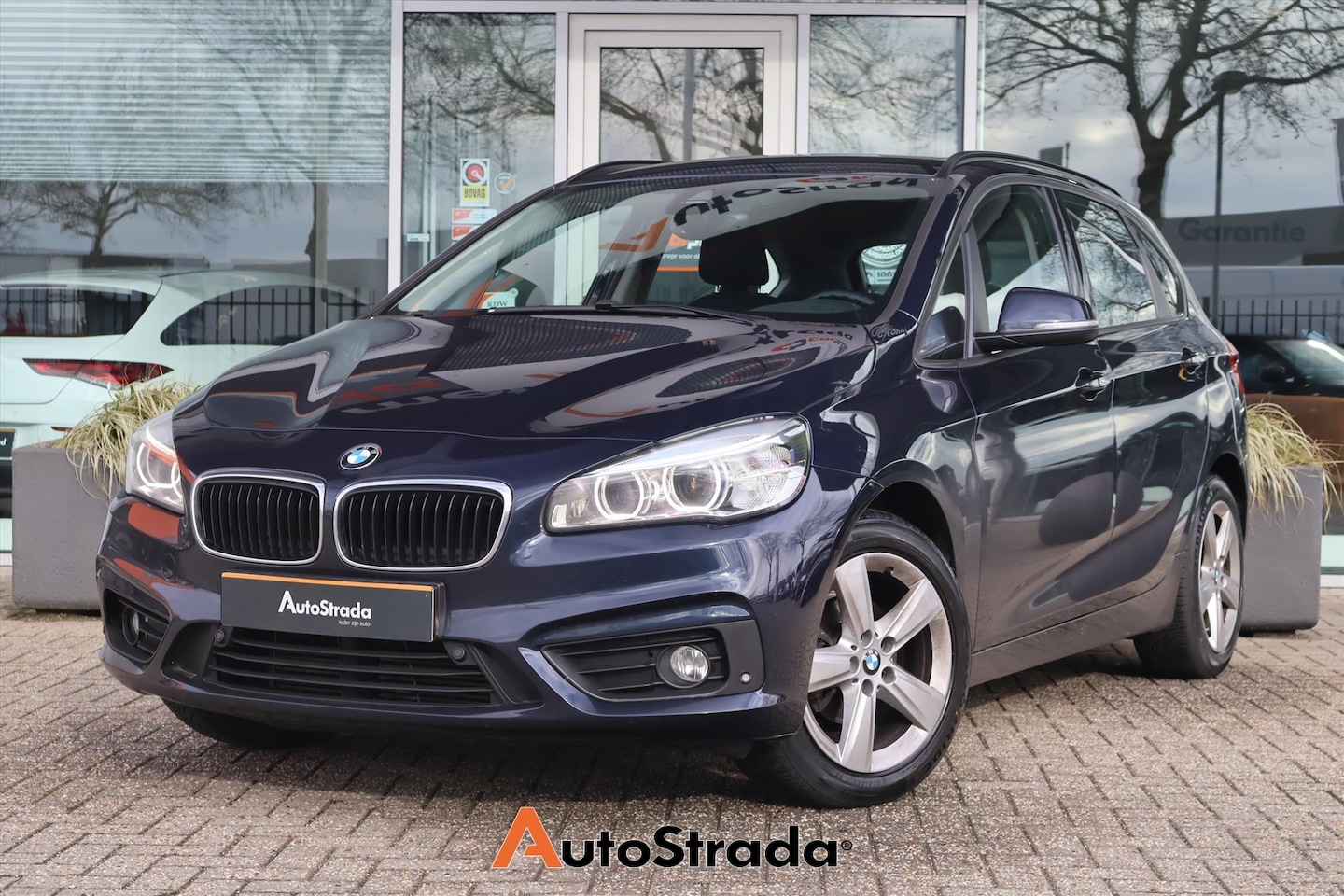 BMW 2-serie Active Tourer - (f45) 216i High Executive 102pk | Cruise | Climate | Stoelverwarming | Trekhaak | Keyless - AutoWereld.nl