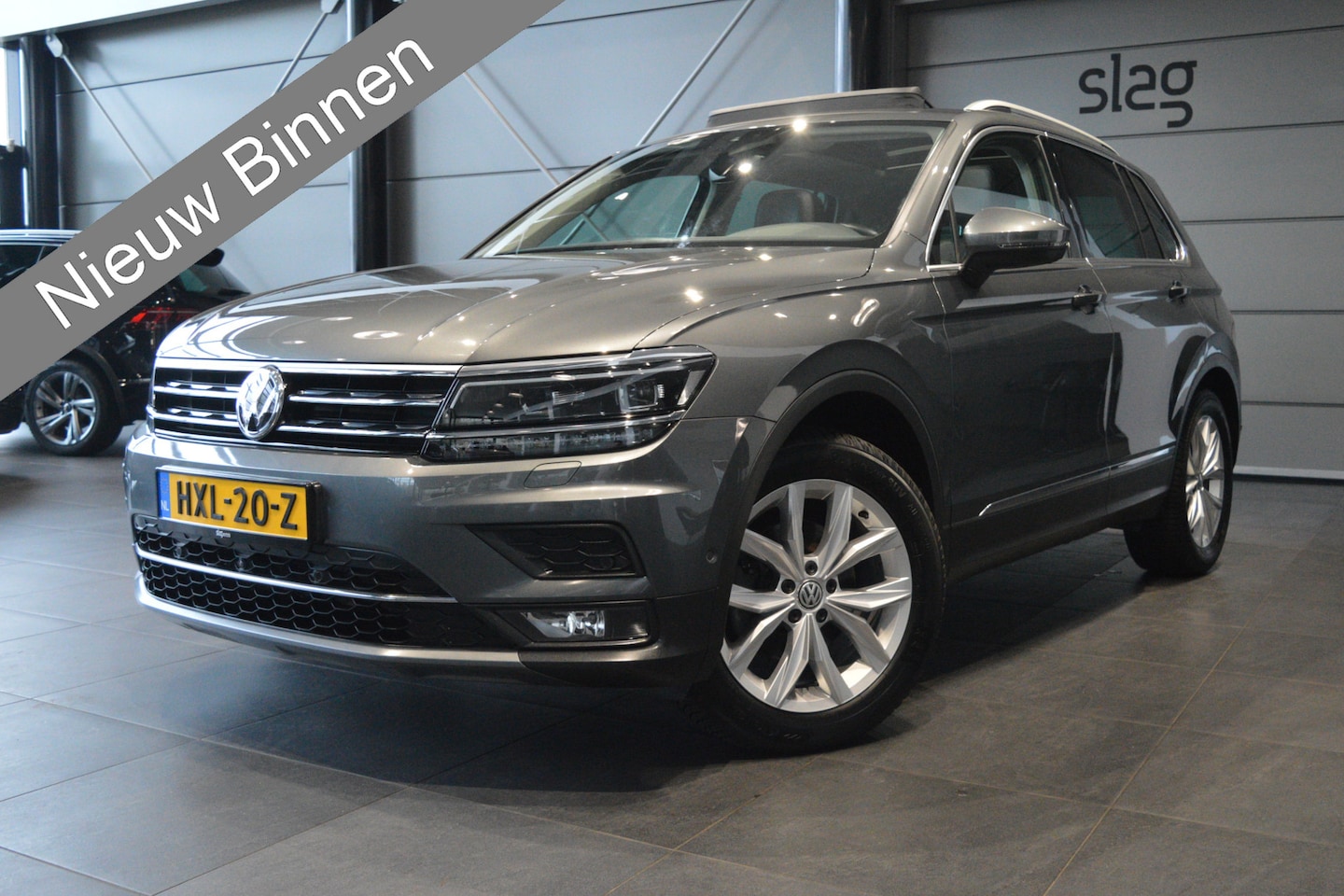 Volkswagen Tiguan - 1.4 TSI ACT Highline pano leer camera trekhaak 150 pk !! - AutoWereld.nl