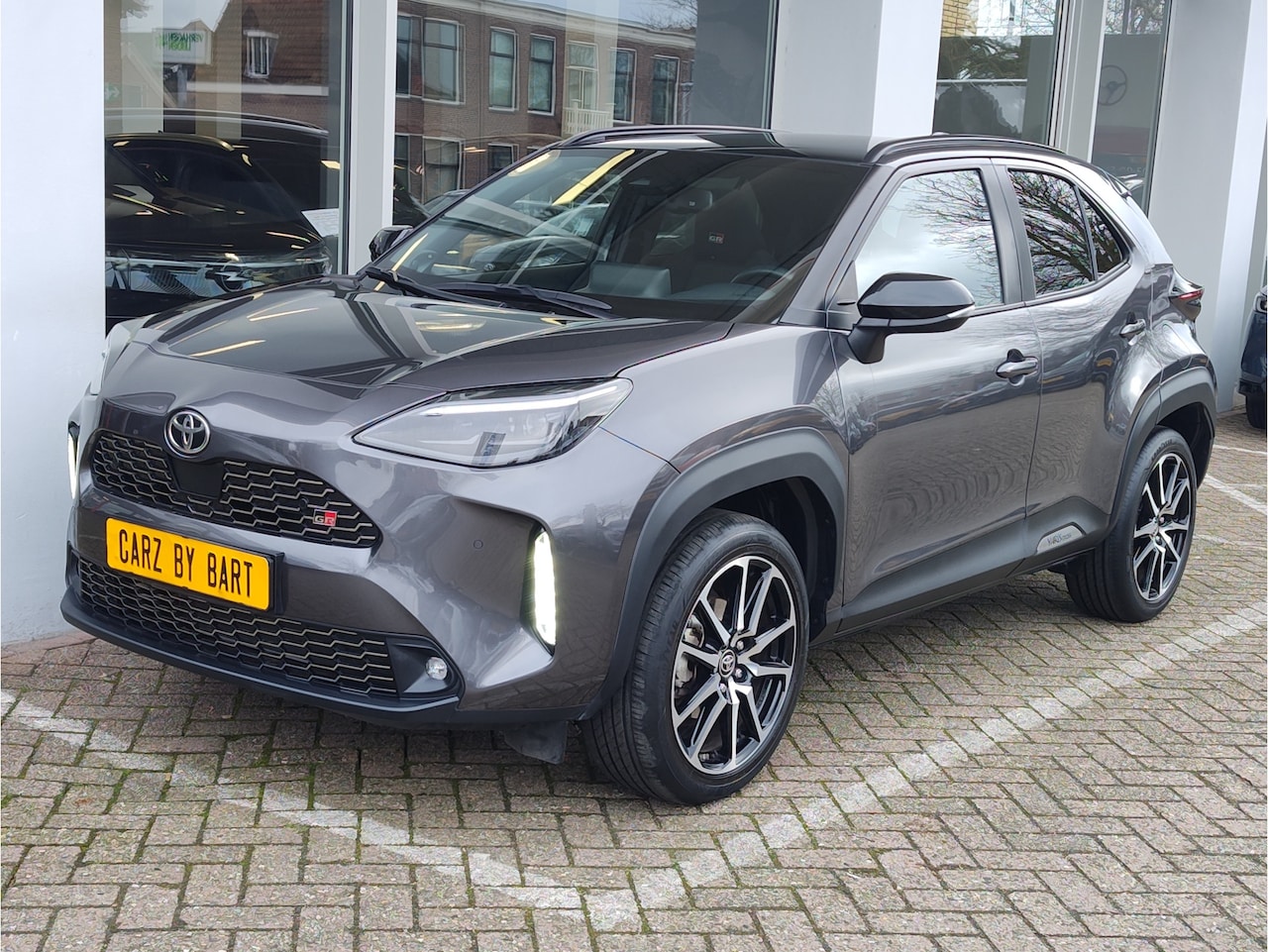 Toyota Yaris Cross - 1.5 HYBRID GR SPORT AUT. Stuurverwarming | Head-up Display | Keyless - AutoWereld.nl