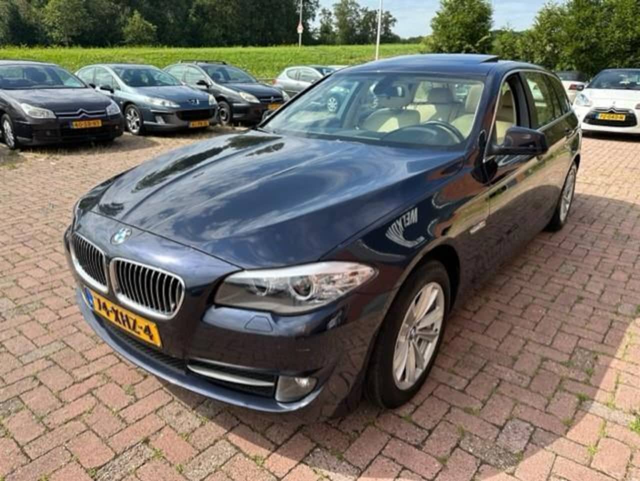 BMW 5-serie Touring - 520i Exec. Aut, Pano - AutoWereld.nl