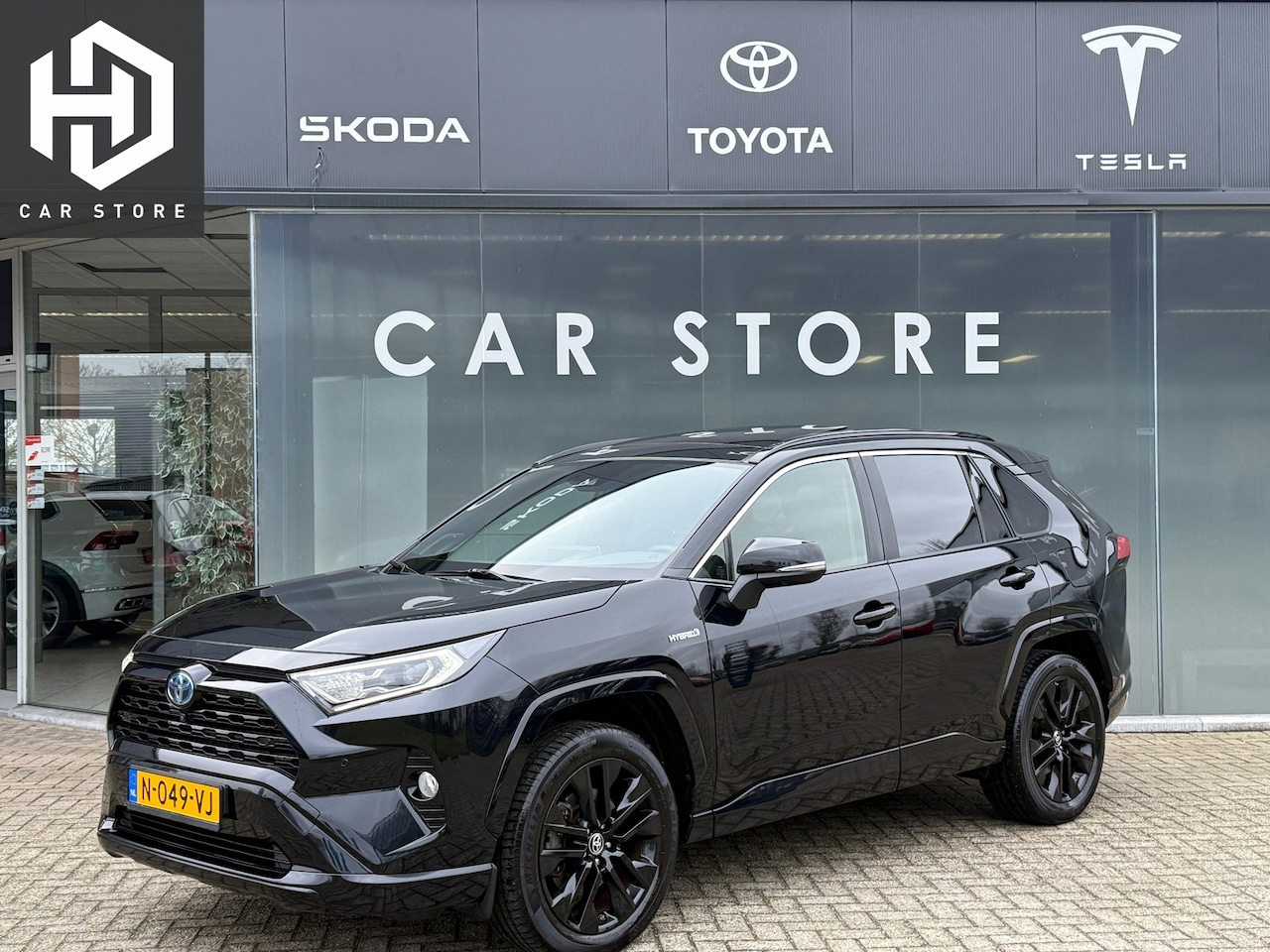 Toyota RAV4 - 2.5 Hybrid AWD Black Edition Pano|Leder|JBL - AutoWereld.nl