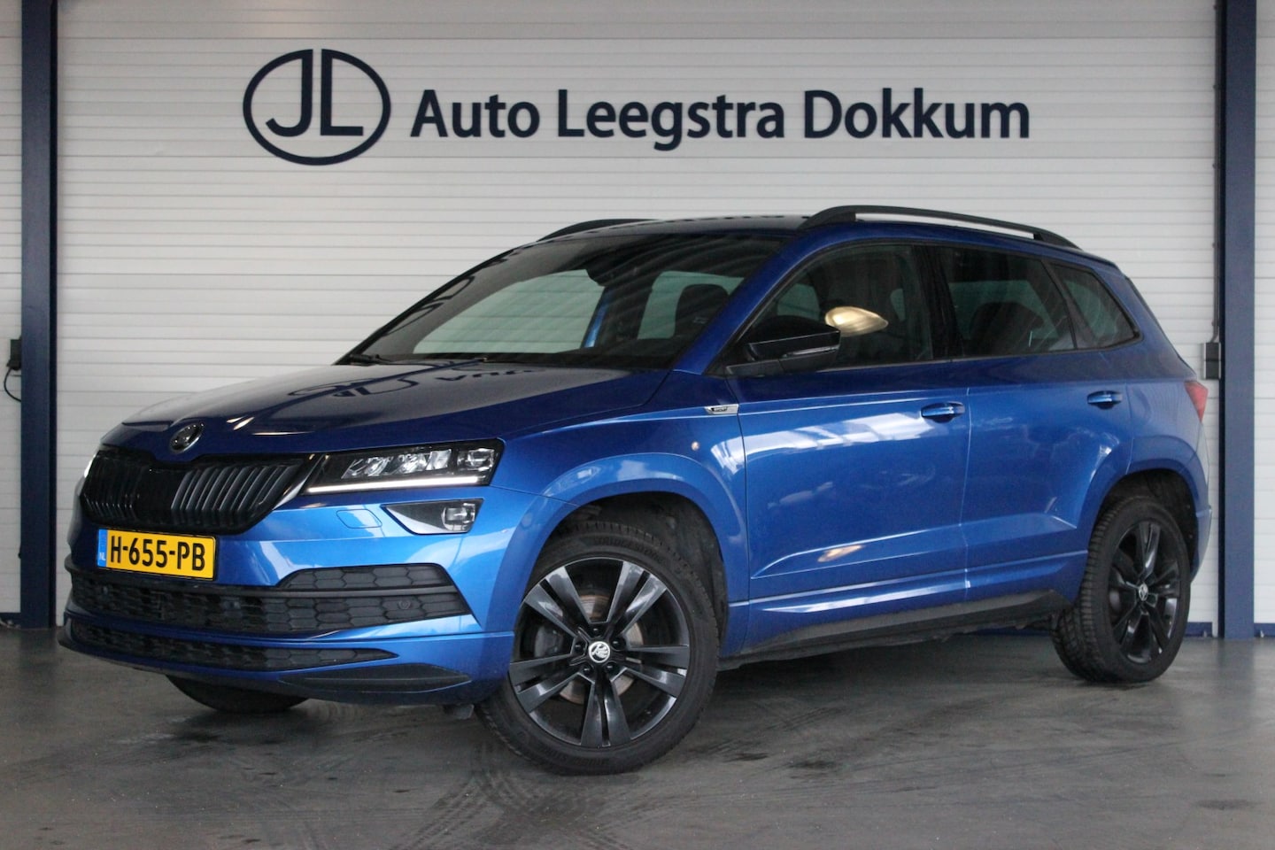 Skoda Karoq - 1.5 TSI ACT Sportline Business 1e eigenaar | Virtual Cockpit | Keyless | Stoelverw. | Carp - AutoWereld.nl
