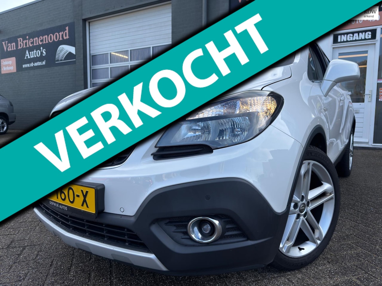Opel Mokka - 1.4 T Innovation 4x4 met leer en parkeersensoren en navigatie en bluetooth telefoon en air - AutoWereld.nl