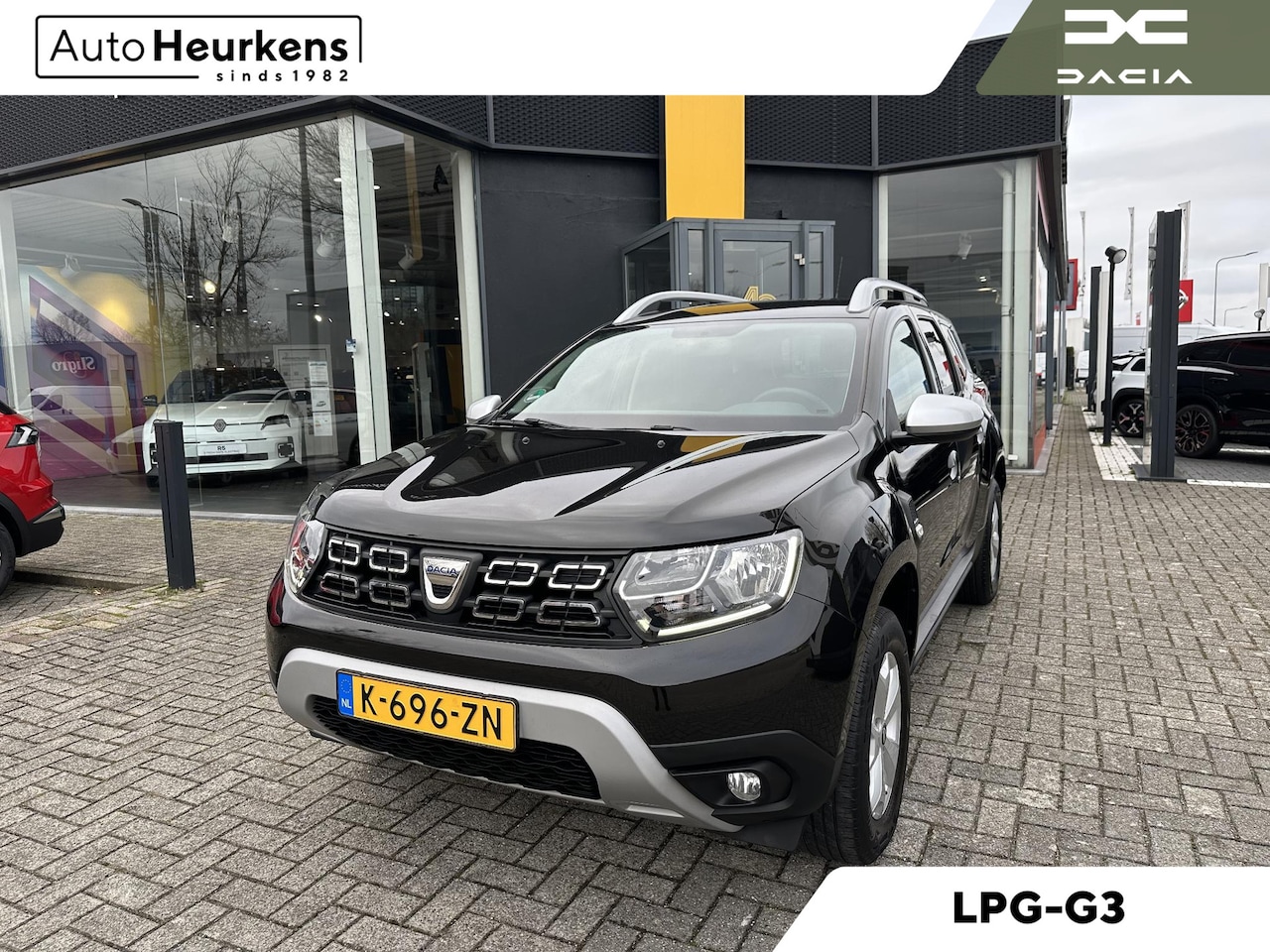Dacia Duster - TCe 100 Bi-Fuel Comfort l Origineel NL | 1e-eigenaar l Dealeronderhouden l NAVI l Parkeers - AutoWereld.nl