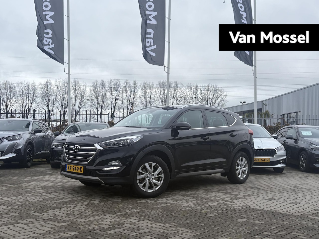 Hyundai Tucson - 1.6 GDi Comfort | Navigatie | Trekhaak | 12 Maand BOVAG | Cruise Control | Dealer Onderhou - AutoWereld.nl