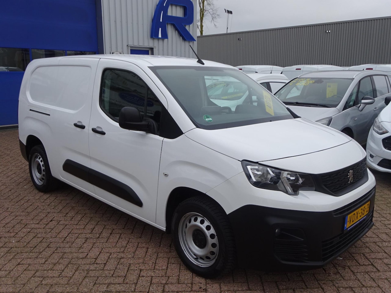 Peugeot Partner - 1.5 BlueHDI Premium Long AIRCO NAVIGATIE CRUISE PDC - AutoWereld.nl