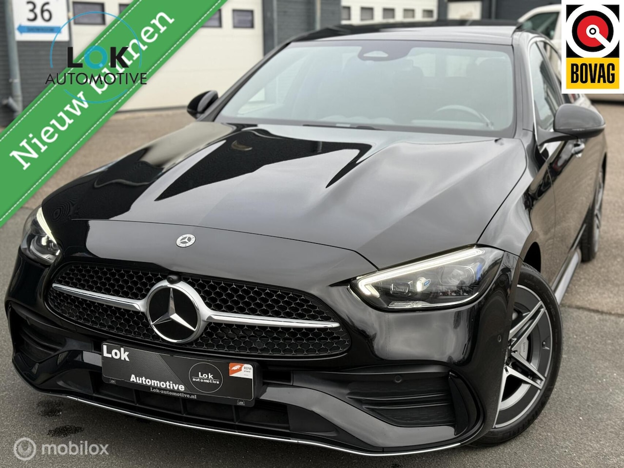 Mercedes-Benz C-klasse - 300 e AMG Line PANO|SFEER|CAMERA|TRKHK - AutoWereld.nl