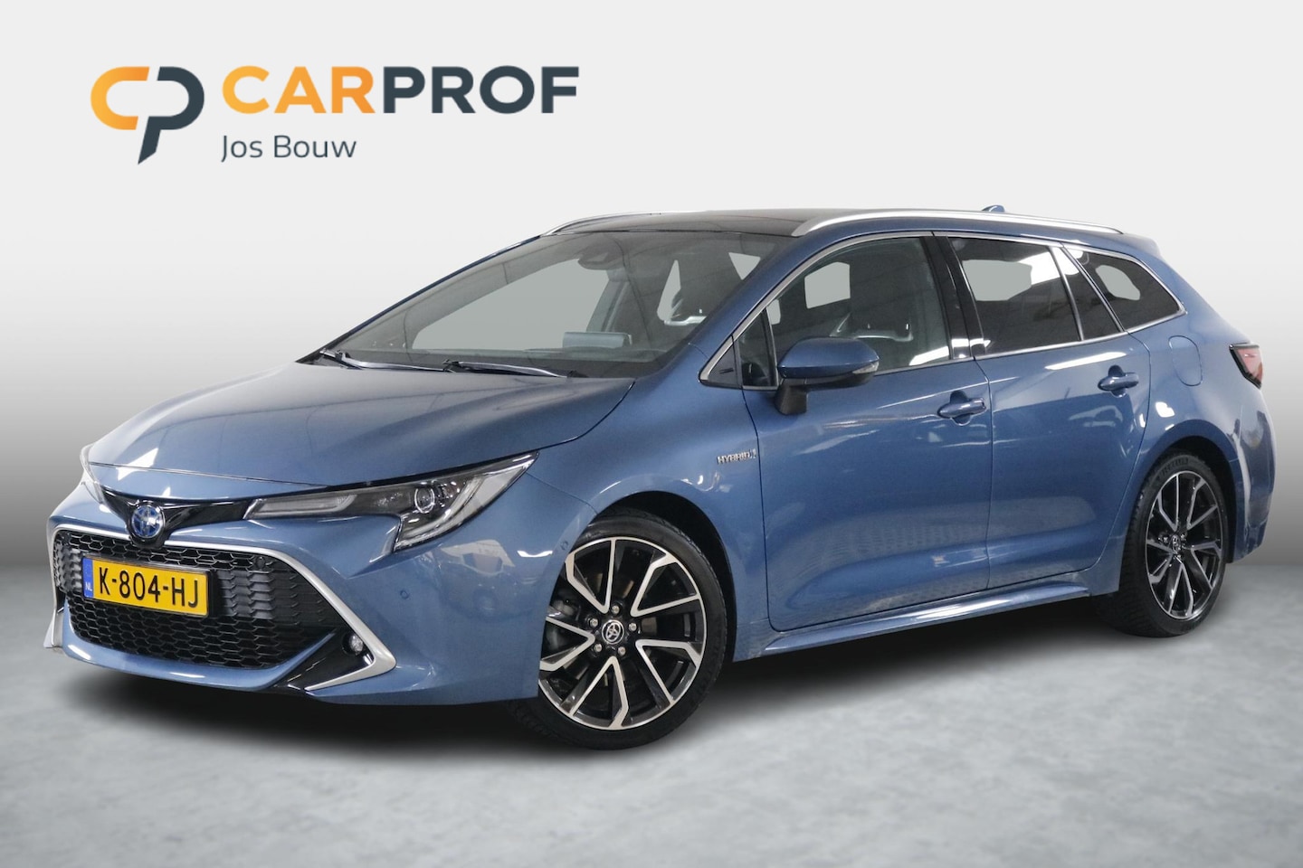 Toyota Corolla Touring Sports - 2.0 Hybrid Premium Climate | Cruise | Leder | Panorama | DAB | LED. - AutoWereld.nl