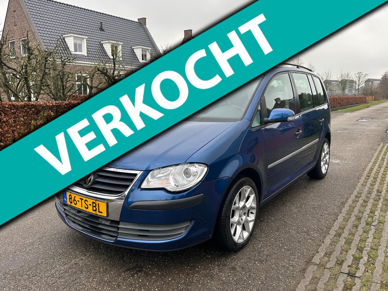 Volkswagen Touran - 1.6 Optive 1.6 Optive - AutoWereld.nl