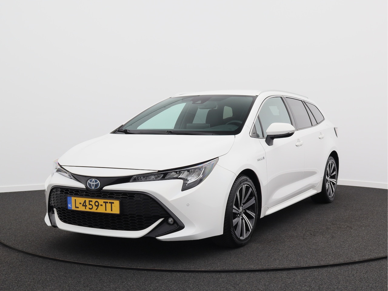 Toyota Corolla Touring Sports - 1.8 Hybrid Business Plus/ lage km/ zeer mooi! - AutoWereld.nl