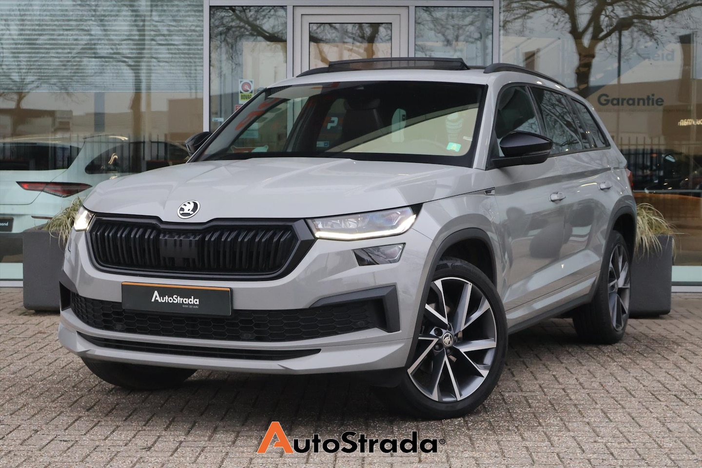 Skoda Kodiaq - 1.5 SportLine TSI ACT 150pk | Pano | Virtual | Adaptive Cruise | Climate | Stoelverwarming - AutoWereld.nl