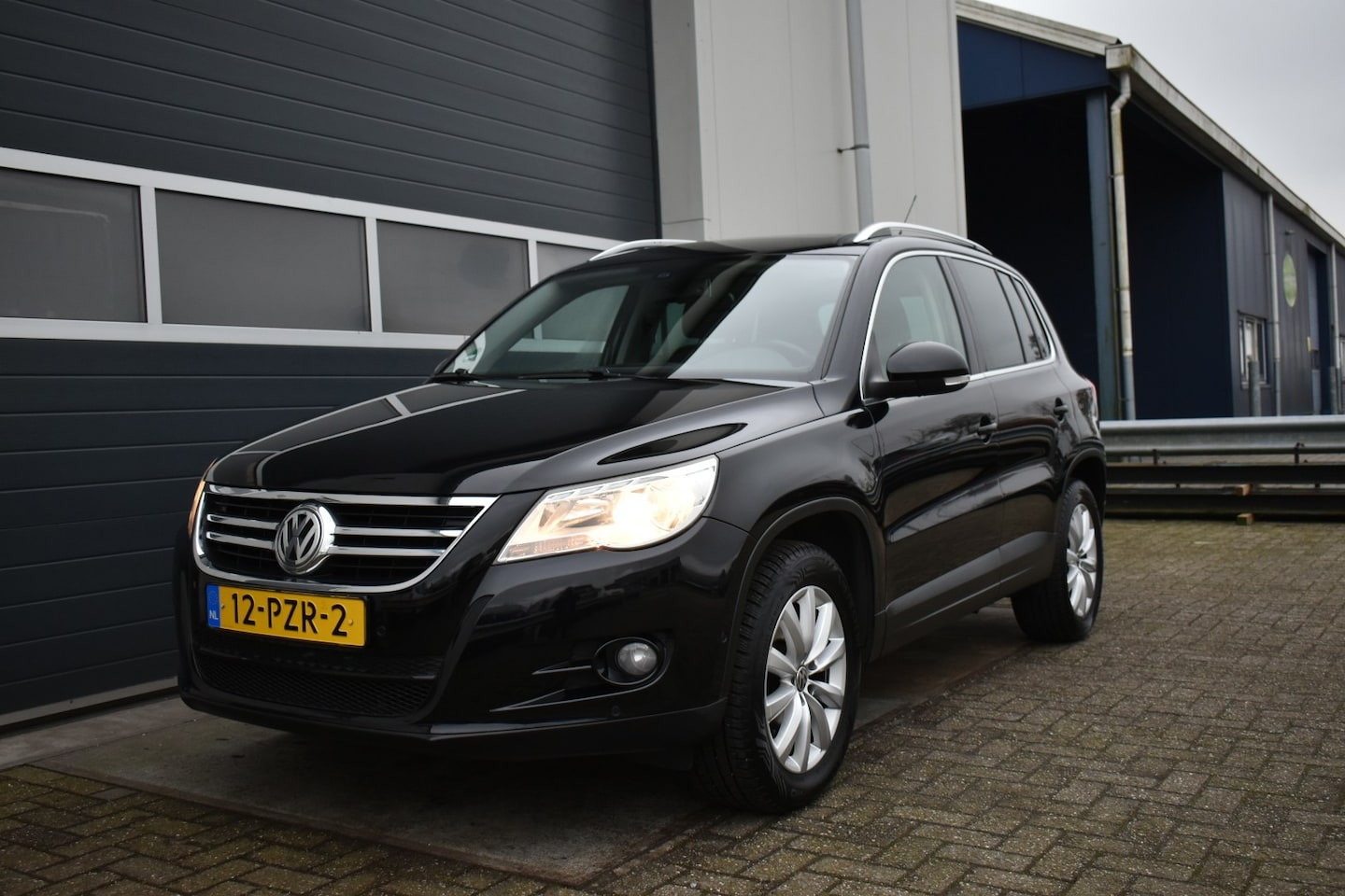 Volkswagen Tiguan - 1.4 TSI Sport&Style - AutoWereld.nl