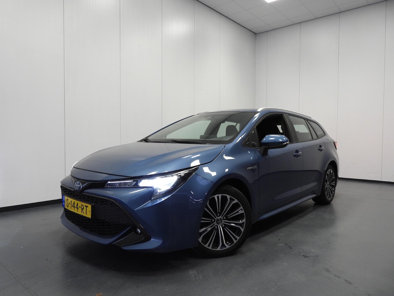 Toyota Corolla Touring Sports - 2.0 Hybrid Dynamic NAVI/CAMERA/CLIMA/17"LMV! - AutoWereld.nl