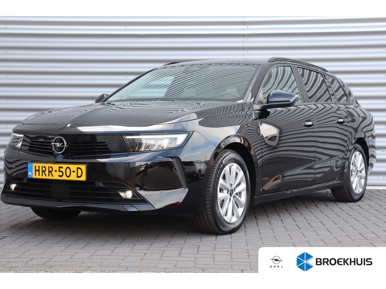 Opel Astra Sports Tourer - 1.2 TURBO 110PK BUSINESS EDITION / NAVI / CLIMA / LED / PDC / AGR / 16" LMV / CAMERA / KEY - AutoWereld.nl