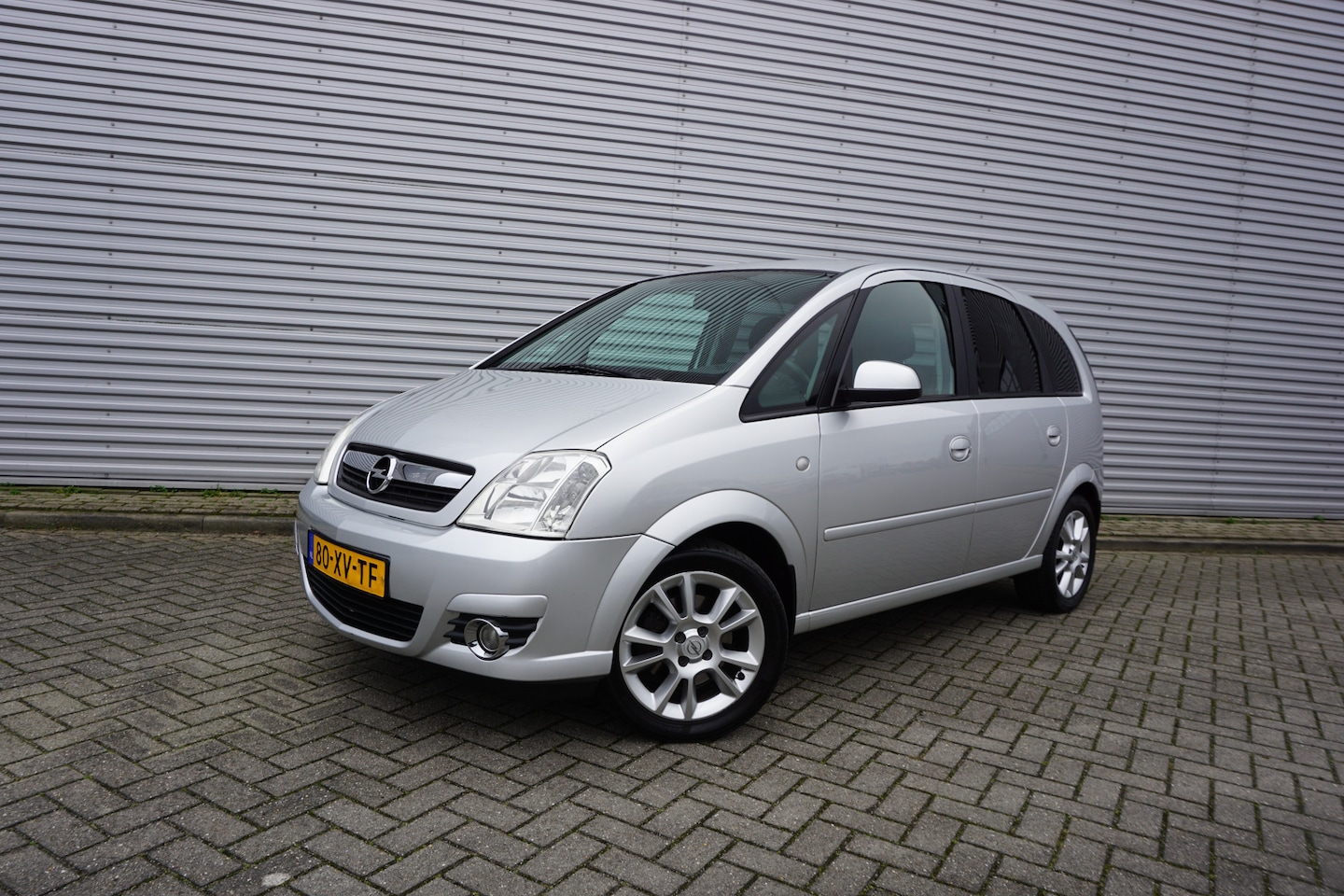 Opel Meriva - 1.6-16V Cosmo AUTOMAAT - Airco / Navi / Elektr. ramen / Parkeersens. / Lm velgen / Trekhaa - AutoWereld.nl