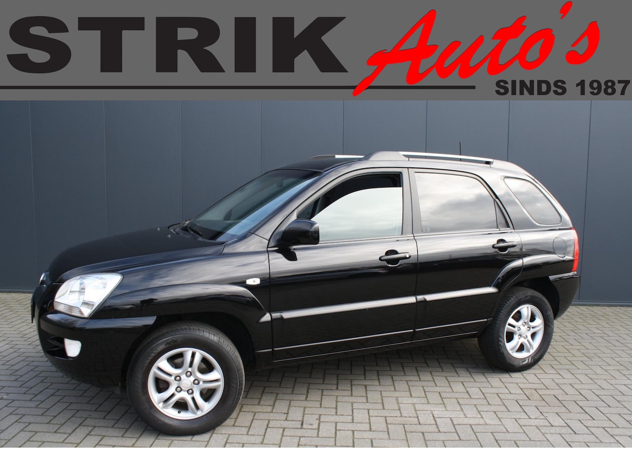 Kia Sportage - 2.0 CVVT X-pression - LEDER - TREKHAAK - CLIMATE CONTROL - AutoWereld.nl