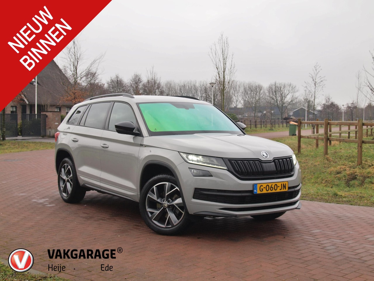 Skoda Kodiaq - 1.5 TSI Sportline Business 7p. |  DSG | 7 Persoons | Trekhaak | Camera | Sfeerverlichting - AutoWereld.nl