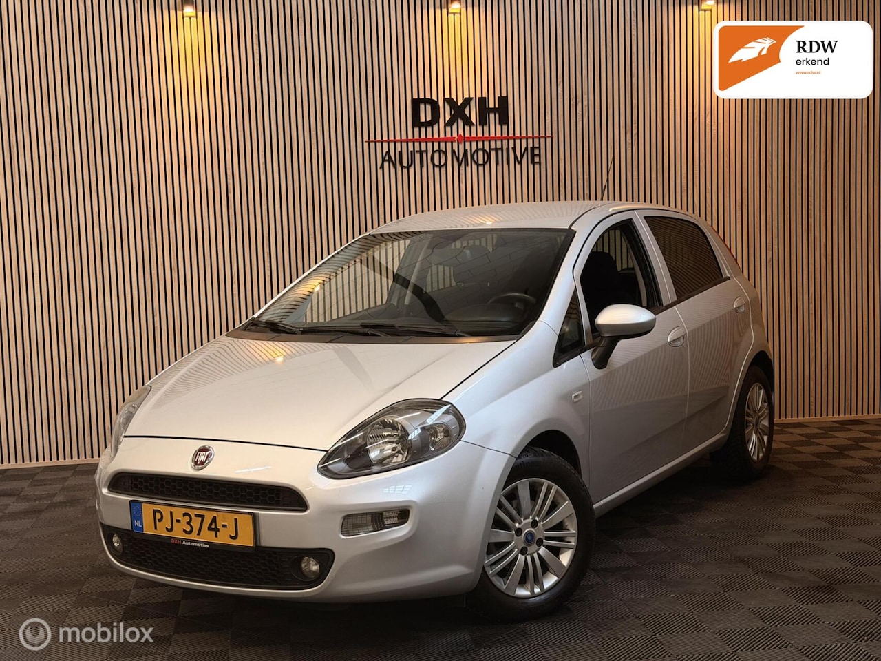 Fiat Punto Evo - 0.9 TwinAir Lounge NAP NAVI BLUET CRUISE PDC - AutoWereld.nl