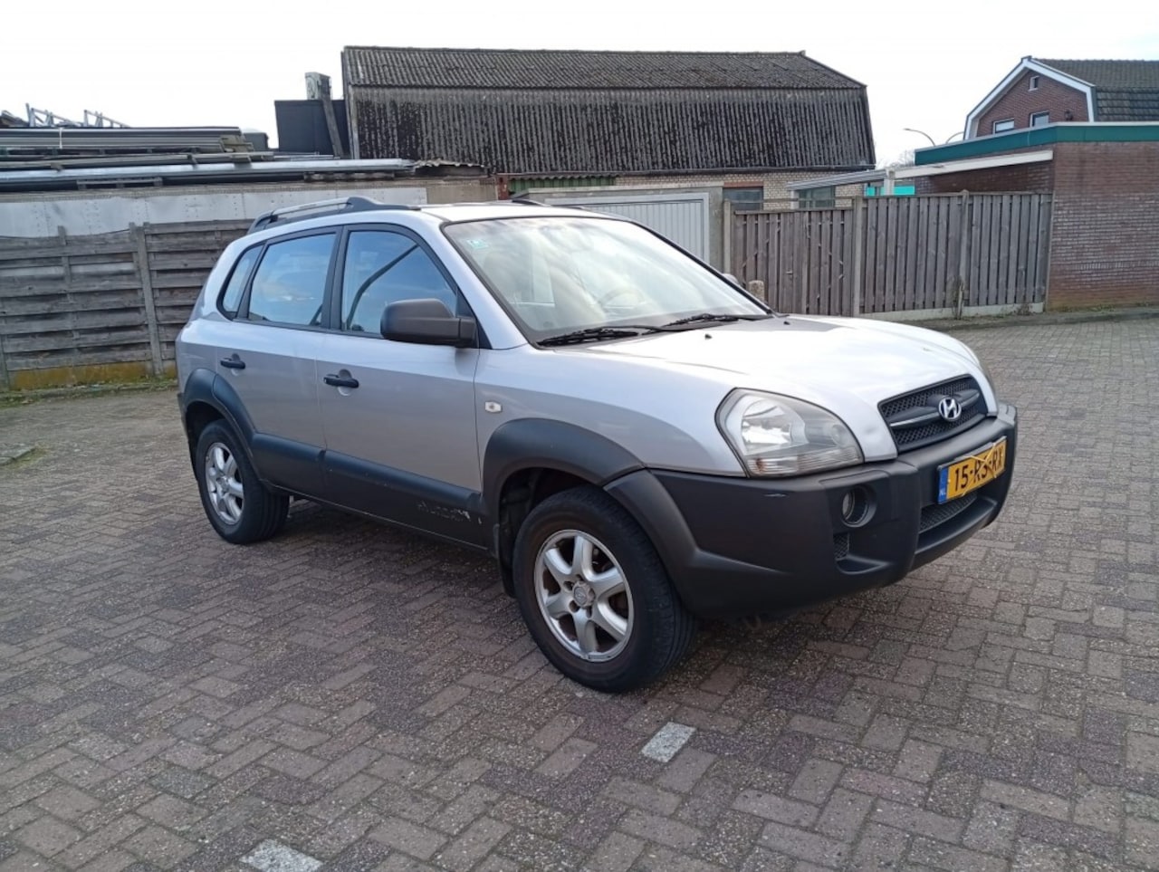 Hyundai Tucson - 2.0i Active 2.0I ACTIVE - AutoWereld.nl