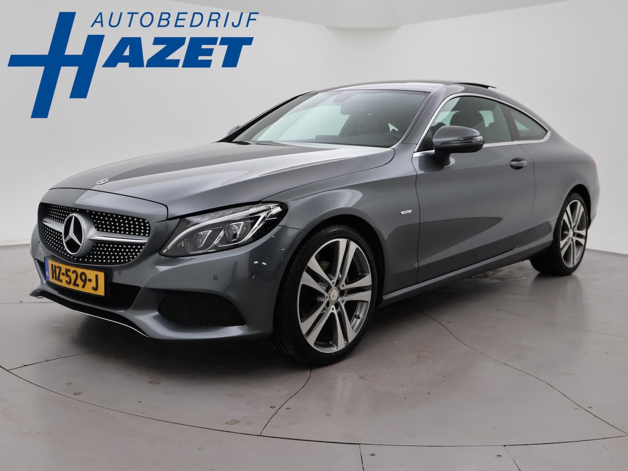 Mercedes-Benz C-klasse Coupé - 180 EDITION 1 AUT.*ORIG. NL / 54.255 KM!* + PANO | SPORSTOELEN | CAMERA | 19 INCH | STOELV - AutoWereld.nl