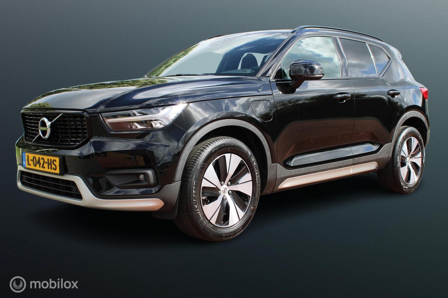 Volvo XC40 - 1.5 T4 Recharge Plug-in Hybride R-Design Expression, Sportstoelen, Panoramadak, Navi, Clim - AutoWereld.nl