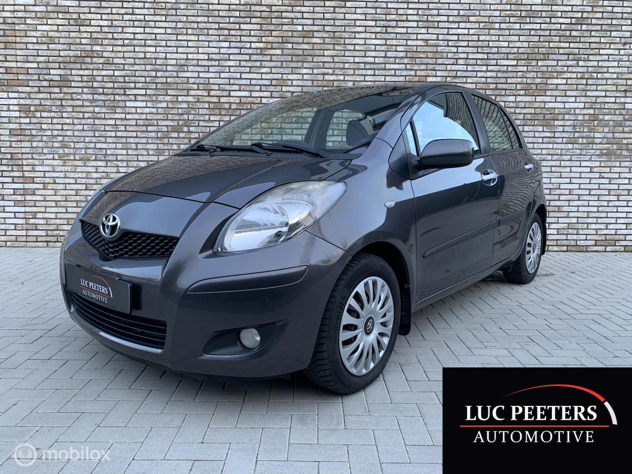 Toyota Yaris - 1.3 VVTi Aspiration AUTOMAAT/NAP/PDC/TREKHAAK! - AutoWereld.nl