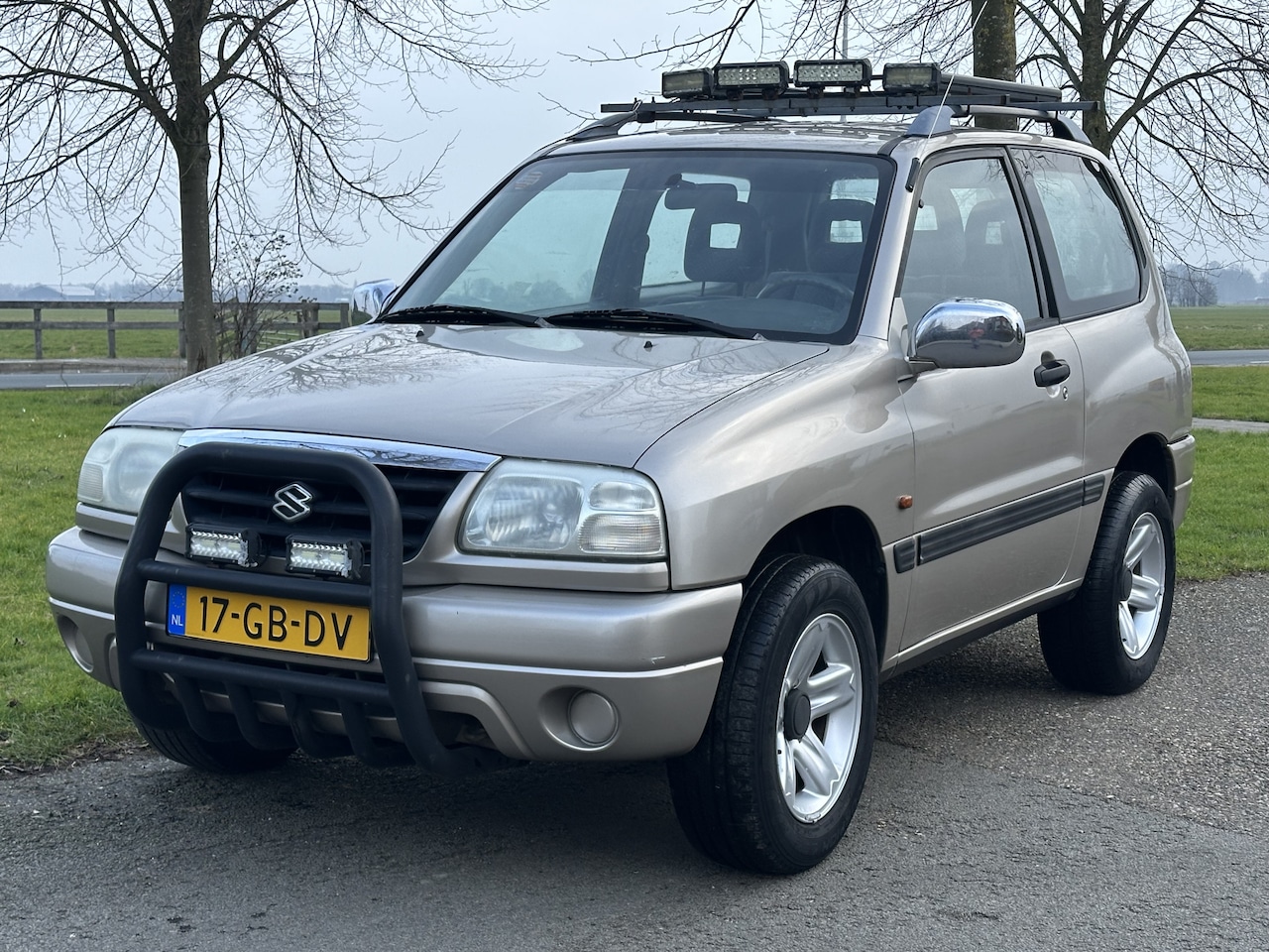 Suzuki Grand Vitara - 2.0 Metal Top NAP * 4X4 - AutoWereld.nl