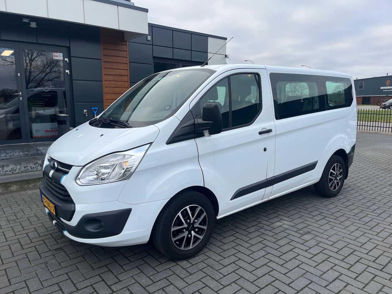 Ford Transit Custom - 310 2.0 TDCI 9 persoons Airco Euro 6 2016 Marge - AutoWereld.nl