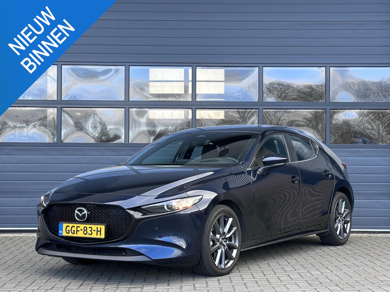 Mazda 3 - 2.0 E-SKYACTIV-X M HYBRID 186 HOMURA I P-CAMERA I ADAPTIVE CRUISE CONTROL I NAVIGATIE I CL - AutoWereld.nl