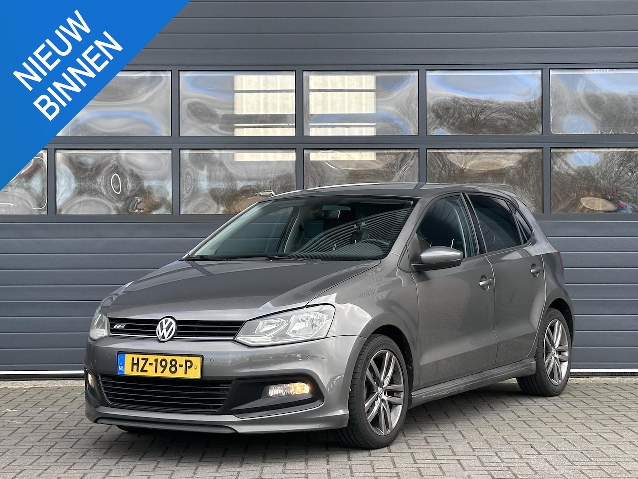 Volkswagen Polo - 1.2 TSI R-LINE I 5-DEURS I CLIMATE CONTROL I NAVIGATIE - AutoWereld.nl