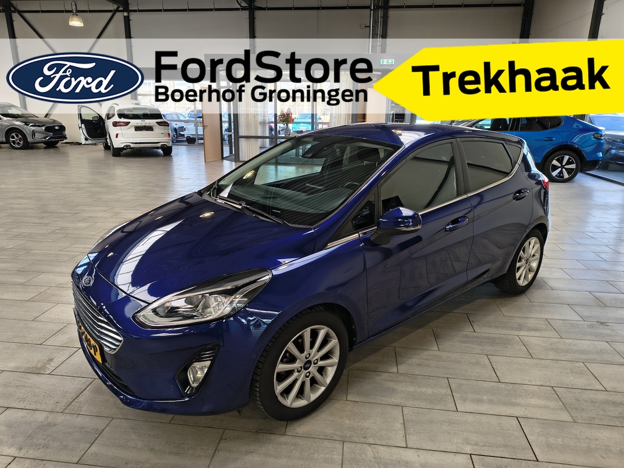 Ford Fiesta - EcoBoost 100 pk Titanium | Trekhaak | Camera | Adapt. cruise | B&O | 4 seiz. banden | 100% - AutoWereld.nl