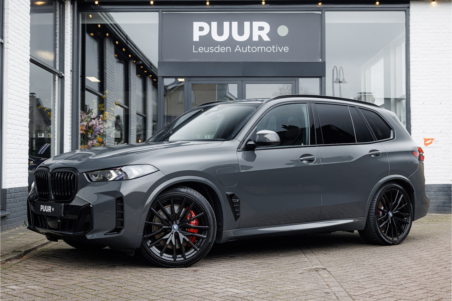BMW X5 - xDrive50e M-Sport Pro Dravit Grau - Harman Kardon - Iconic Glow - AutoWereld.nl