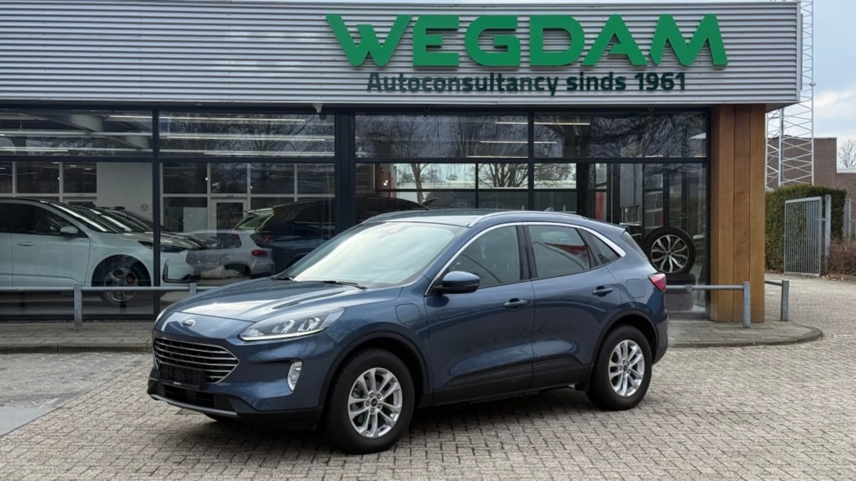 Ford Kuga - 2.5 PHEV TITANIUM / Afn. trekhaak + Winter pack - AutoWereld.nl
