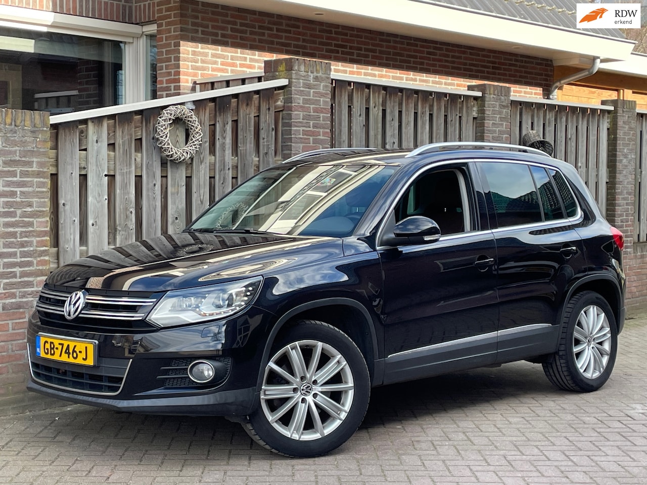 Volkswagen Tiguan - 2.0 TSI Sport&Style 4Motion AUTOMAAT, Trekhaak, stoelverw. - AutoWereld.nl