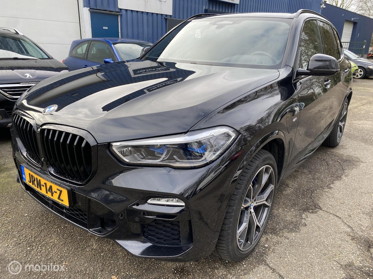 BMW X5 - 45e xDrive High Executive |M-pakket|schuif/kantel dak|Harman&Kardon|Laser LED|achter-as me - AutoWereld.nl