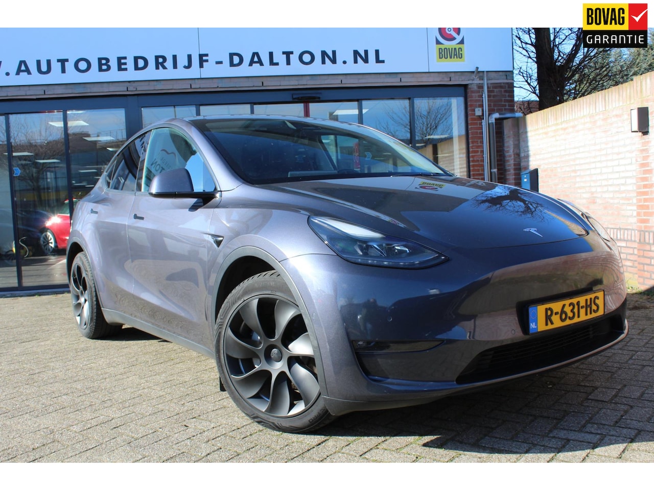 Tesla Model Y - Long Range AWD 75 kWh TREKHAAK /Enhanced AUTOPILOT - AutoWereld.nl