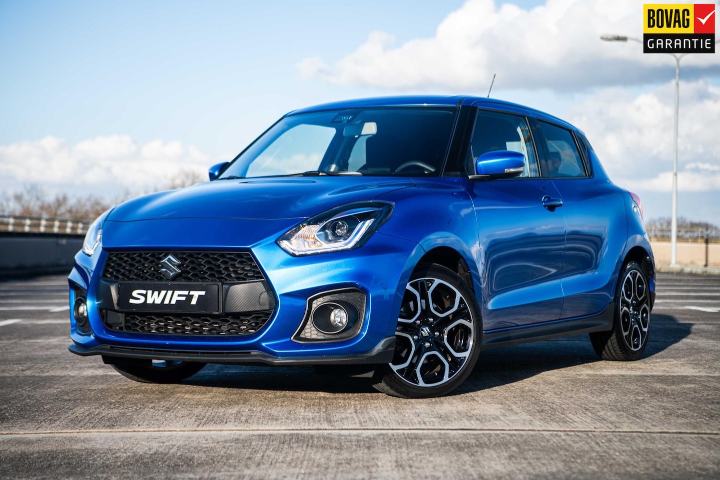 Suzuki Swift - 1.4 Sport Smart Hybrid | Airco/Clima | Adaptive Cruise Control | Camera | Stoelverwarming - AutoWereld.nl
