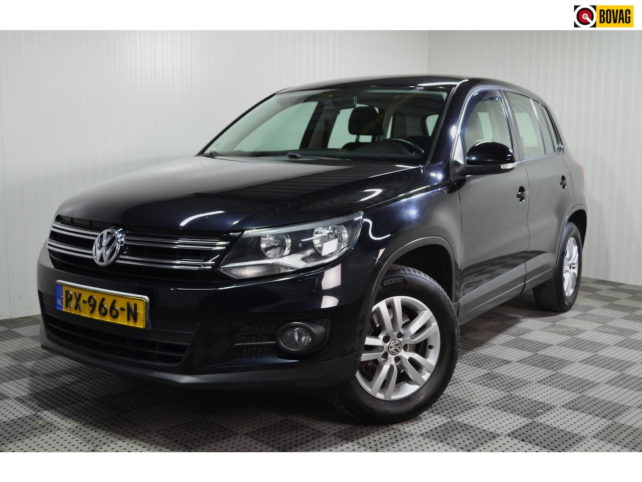 Volkswagen Tiguan - 1.4 TSI Sport&Style / Trekhaak / Stoelverwarming - AutoWereld.nl
