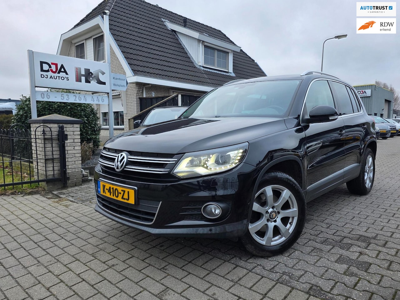 Volkswagen Tiguan - 2.0 TSI Sport&Style 4Motion - AutoWereld.nl