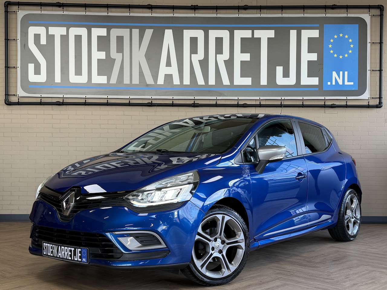 Renault Clio - 1.2 GT 120pk AUT | Navi | Bose | 17" | Led | PDC | Clima | Sportstoelen | Keurig netjes en - AutoWereld.nl