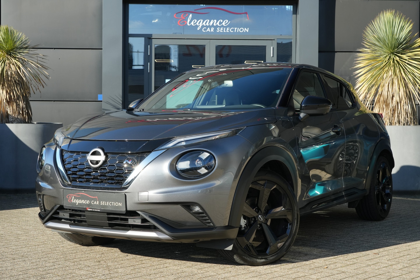 Nissan Juke - 1.6 Hybrid Tekna 143pk Stoelverwarming/Navigatie/360Camera - AutoWereld.nl