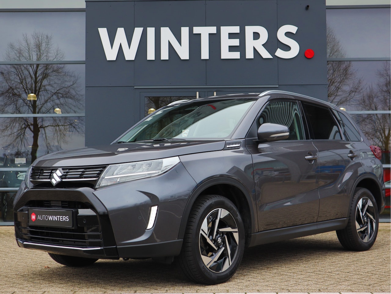 Suzuki Vitara - 1.5 Hybrid Style Automaat | Panoramadak | All-Seasons | Stoelverwarming | 10Jr. Garantie | - AutoWereld.nl