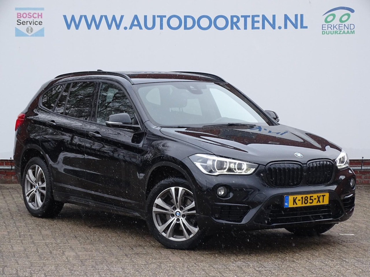 BMW X1 - SDrive18i High Executive|Trekhaak|Camera|Sportstoel - AutoWereld.nl