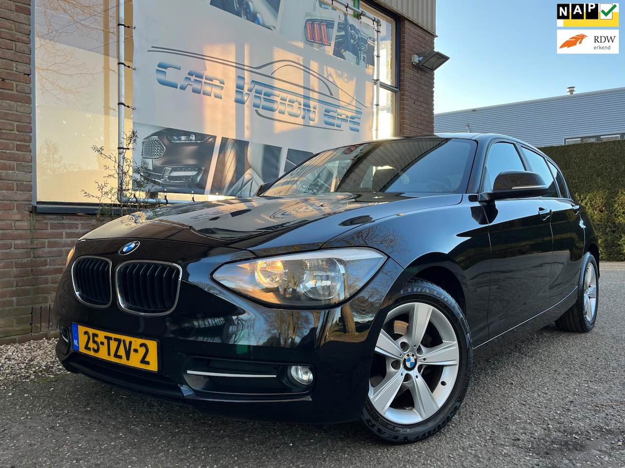 BMW 1-serie - 116i Business|Sport|Navi|Trekhaak| - AutoWereld.nl